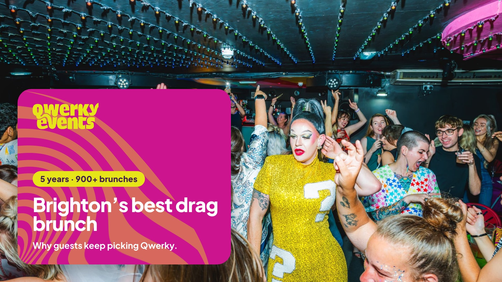 A Qwerky drag queen dancing with a packed room at Legends Brighton