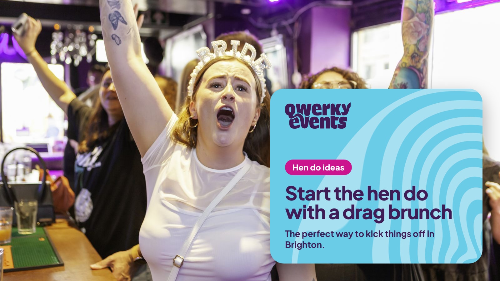 A bride-to-be in a BRIDE tiara cheering with her friends at a Qwerky drag brunch